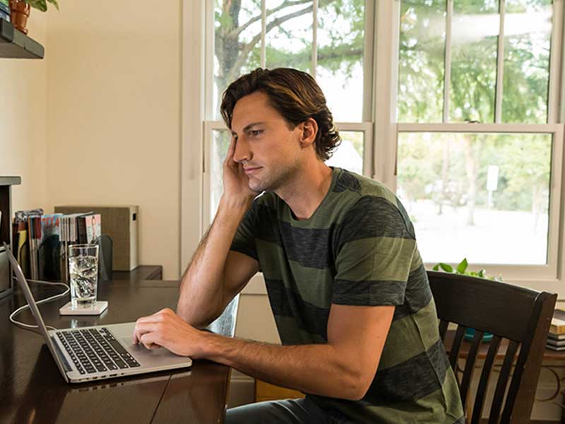 Man looking at Tablet