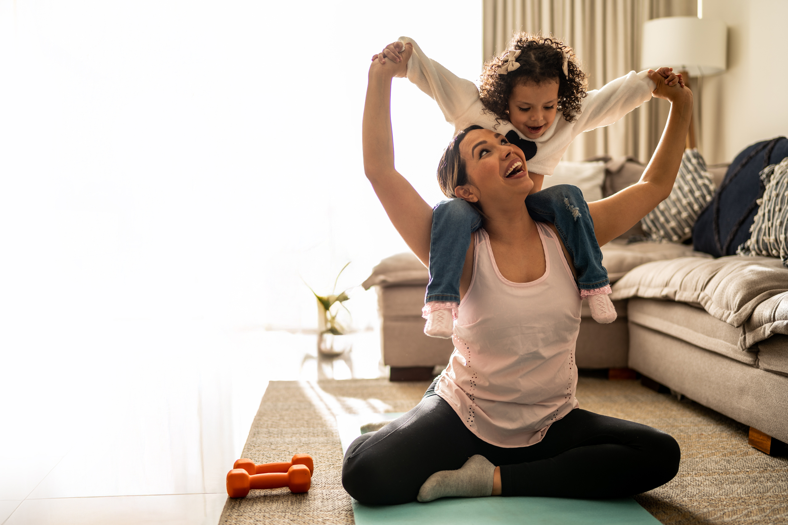 Woman and girl playing